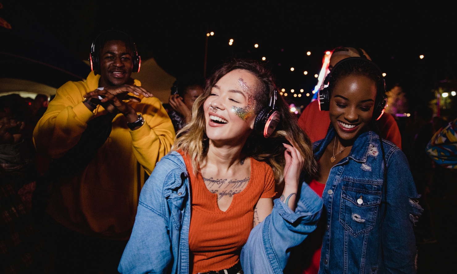 A group of people are enjoying a silent disco